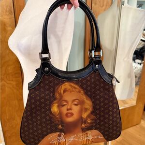 Brown Designer Handbag with Iconic Print